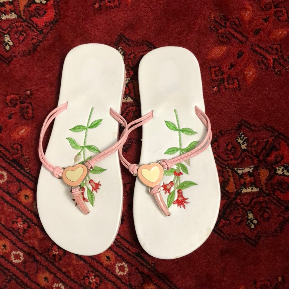 Beautiful flip flops with heart decoration  size 9